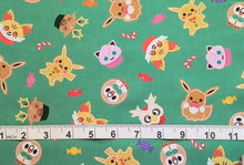 Load image into Gallery viewer, Holiday Pokemon Turquoise - Robert Kaufman - 1/2 Meter - Cotton Fabric