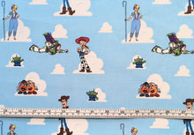 Load image into Gallery viewer, Toy Story Friends Sketch - Light Blue Fabric - 1/2 Meter - Cotton Fabric
